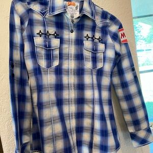 Ladies extra small Roar rodeo shirt with sponsors patches.